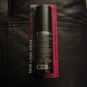 Hard candy makeup setting spray